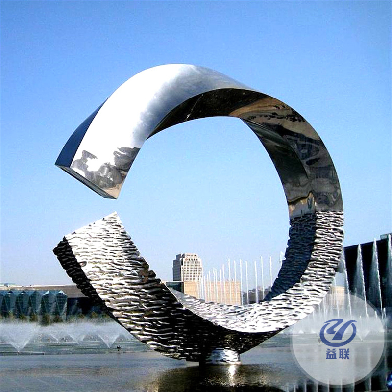 精神堡壘商場景區(qū)落地大型景觀工程發(fā)光轉盤路口邊標志性景墻雕塑